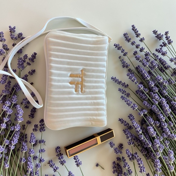 Tom Ford White Quilted Bag with Gold Accent and Tom Ford lip color. - Picture 2 of 5
